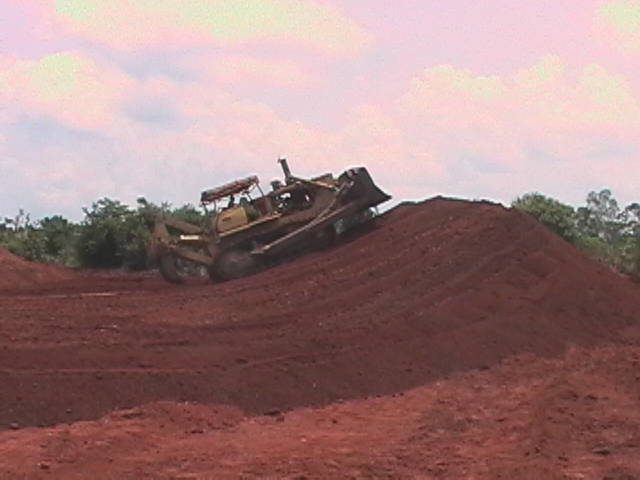 Bulldozer extracting murram.