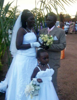 Groom Pastor Pius and bride Damali Nagawa