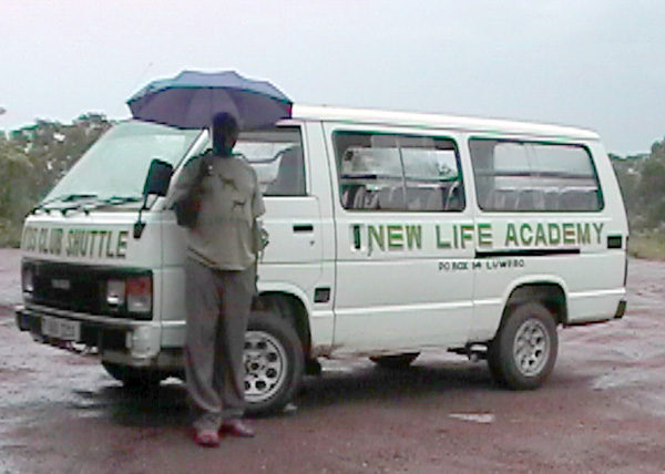 David Kasule with NLA Kids